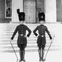 ROTC band conductors standing next to Old Capitol, The University of Iowa, 1930